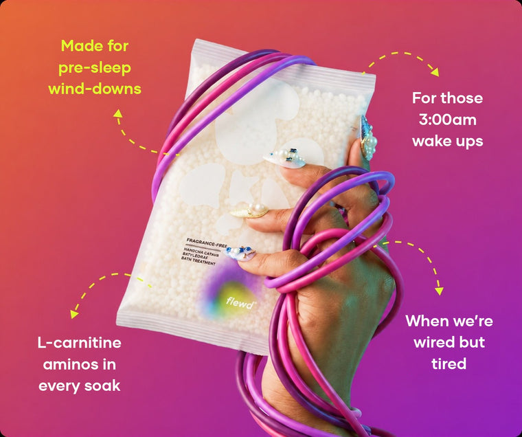 Fragrance-free Insomnia Ending pouch in a hand wrapped in purple cables, part of the Flewd Stresscare Trio