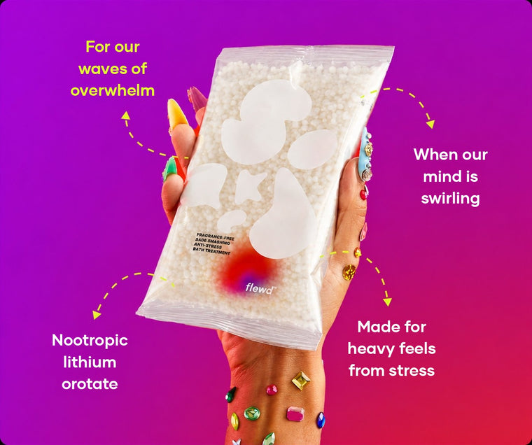 Fragrance-free Sads Smashing pouch in a hand with jeweled nails, part of the Flewd Whole Mood Bundle