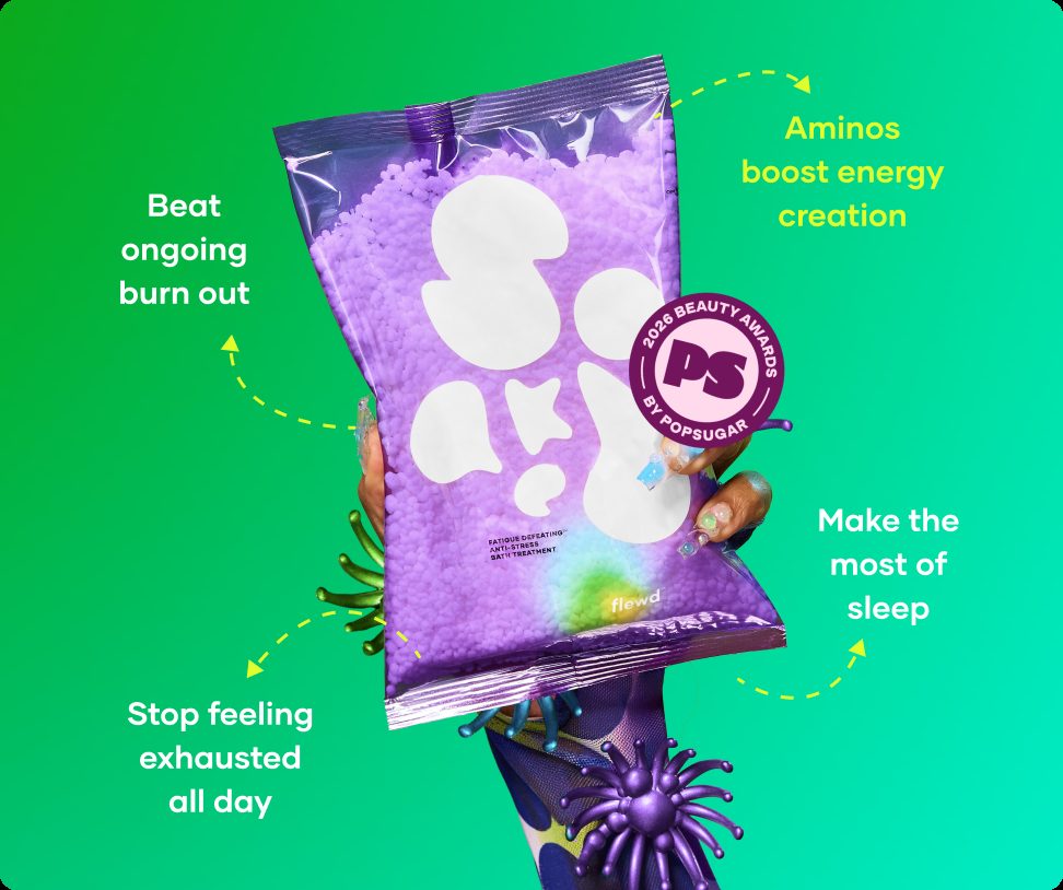 Flewd Fatigue Defeating bath soak pouch held up on a green background, for tired, drained days