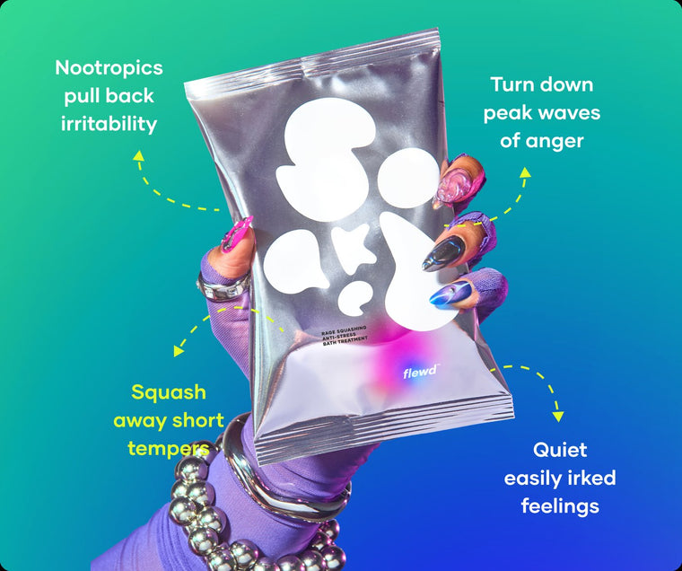 Rage Squashing pouch held by a purple glove, part of the Flewd Nootropic Trio