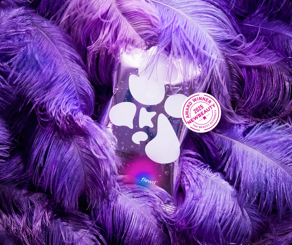 Flewd Rage Squashing stresscare bath soak pouch in purple feathers with a NewBeauty award badge
