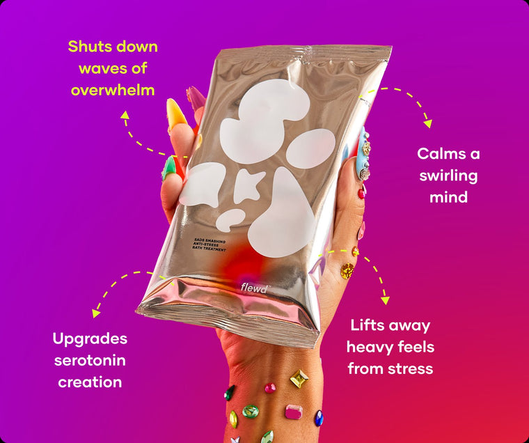 Sads Smashing pouch in a hand with jeweled nails, part of the Flewd Whole Mood Bundle