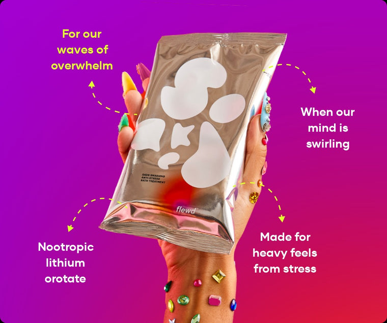 Sads Smashing pouch in a hand with jeweled nails, part of the Flewd Whole Mood Bundle